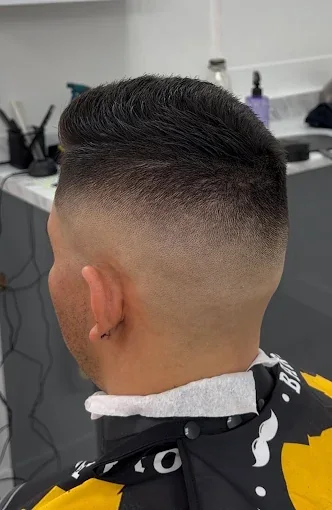 Back view of a smooth skin fade with a clean transition